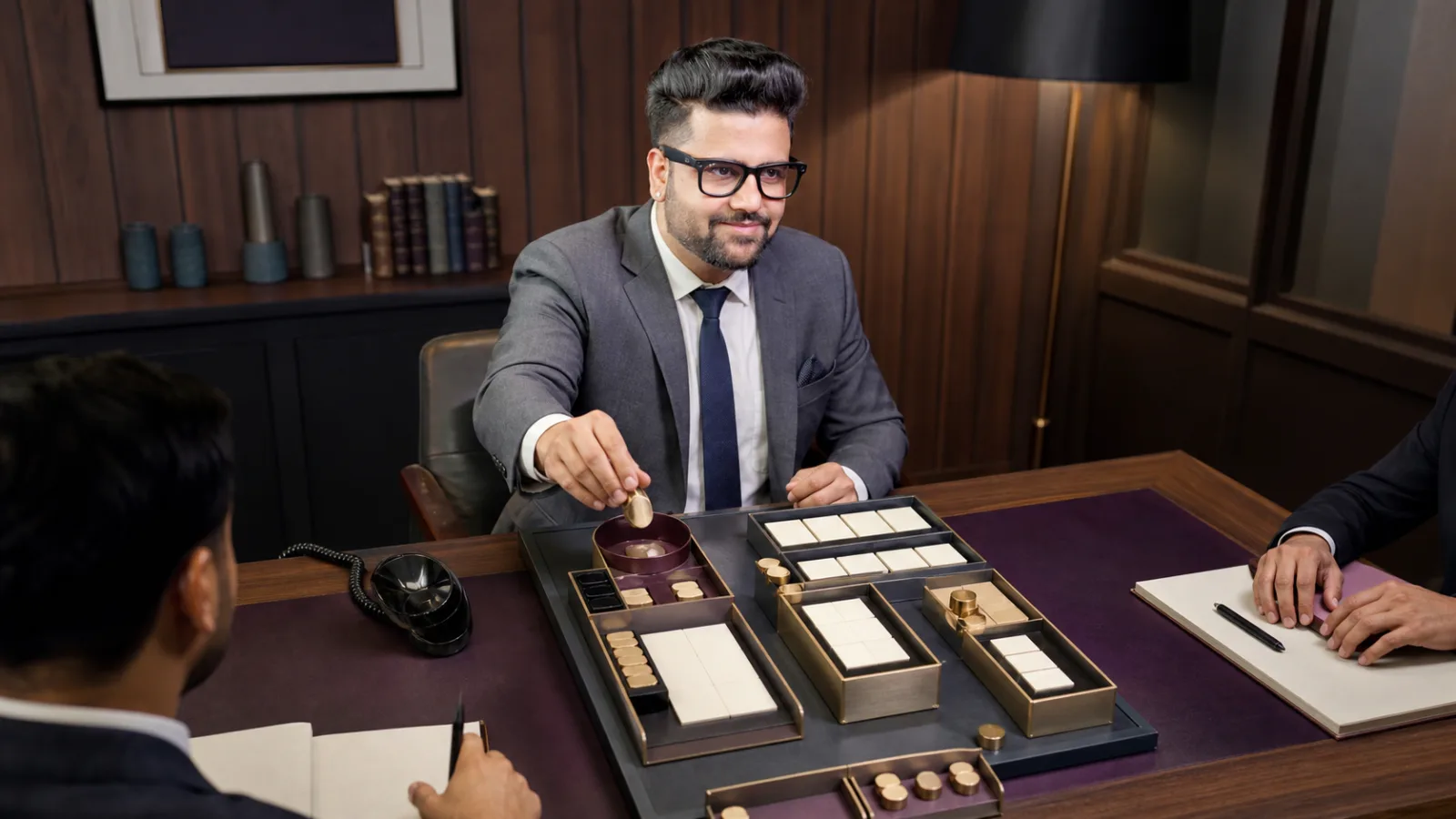 Sahil Khanna reviewing an evidence wall in a executive decision lab for Telemarketing